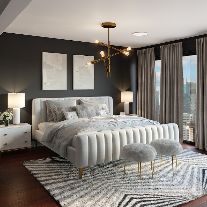 A quiet bedroom with heavy curtains drawn against the morning.